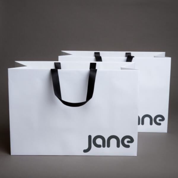 Jane paper shopper with black ribbon