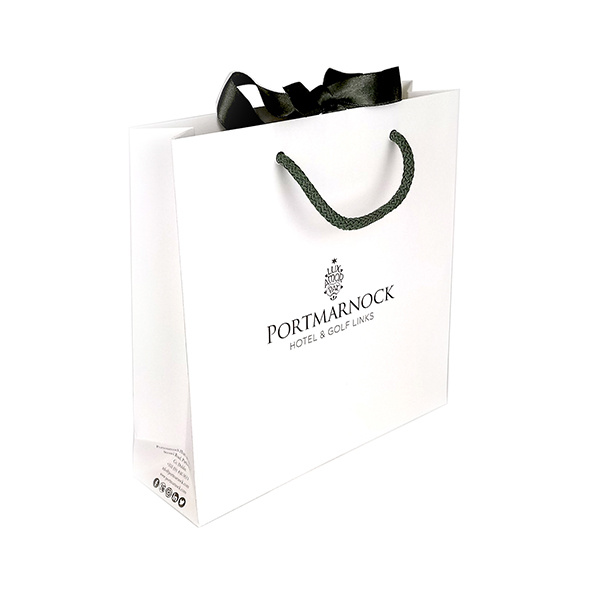 New white with black words paper bag
