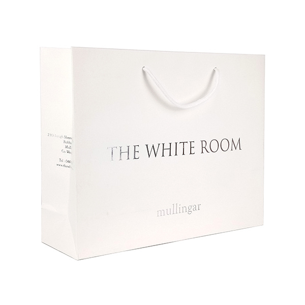 The white room brand paper shopper