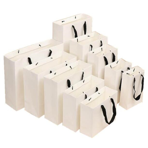 white paper bag with black ribbon